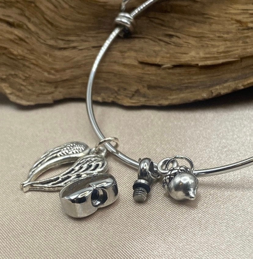 Stainless steel urn pendant for human ashes