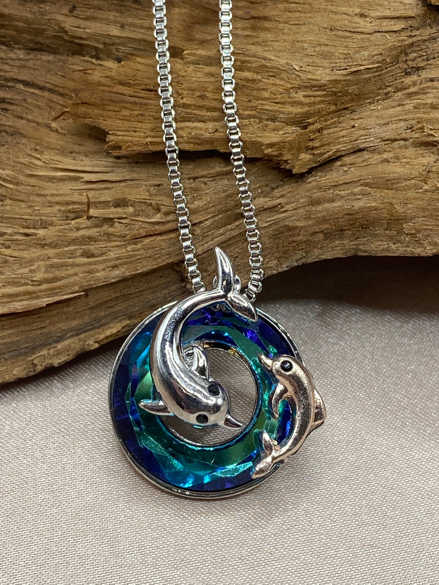 Graceful Dolphin Cremation Necklace – Urn Pendant with Blue Stones for Ashes