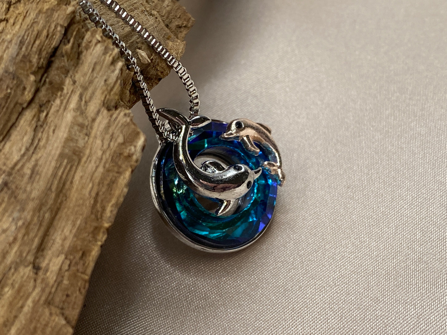 Graceful Dolphin Cremation Necklace – Urn Pendant with Blue Stones for Ashes