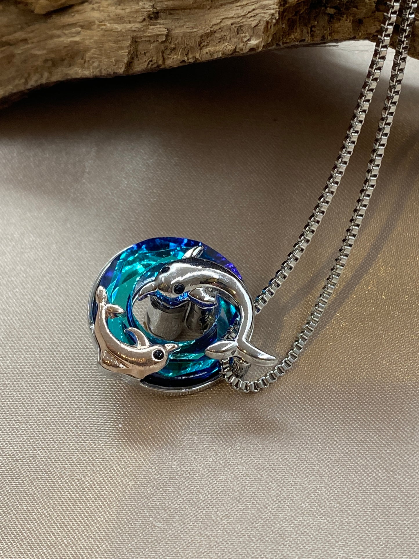 Graceful Dolphin Cremation Necklace – Urn Pendant with Blue Stones for Ashes