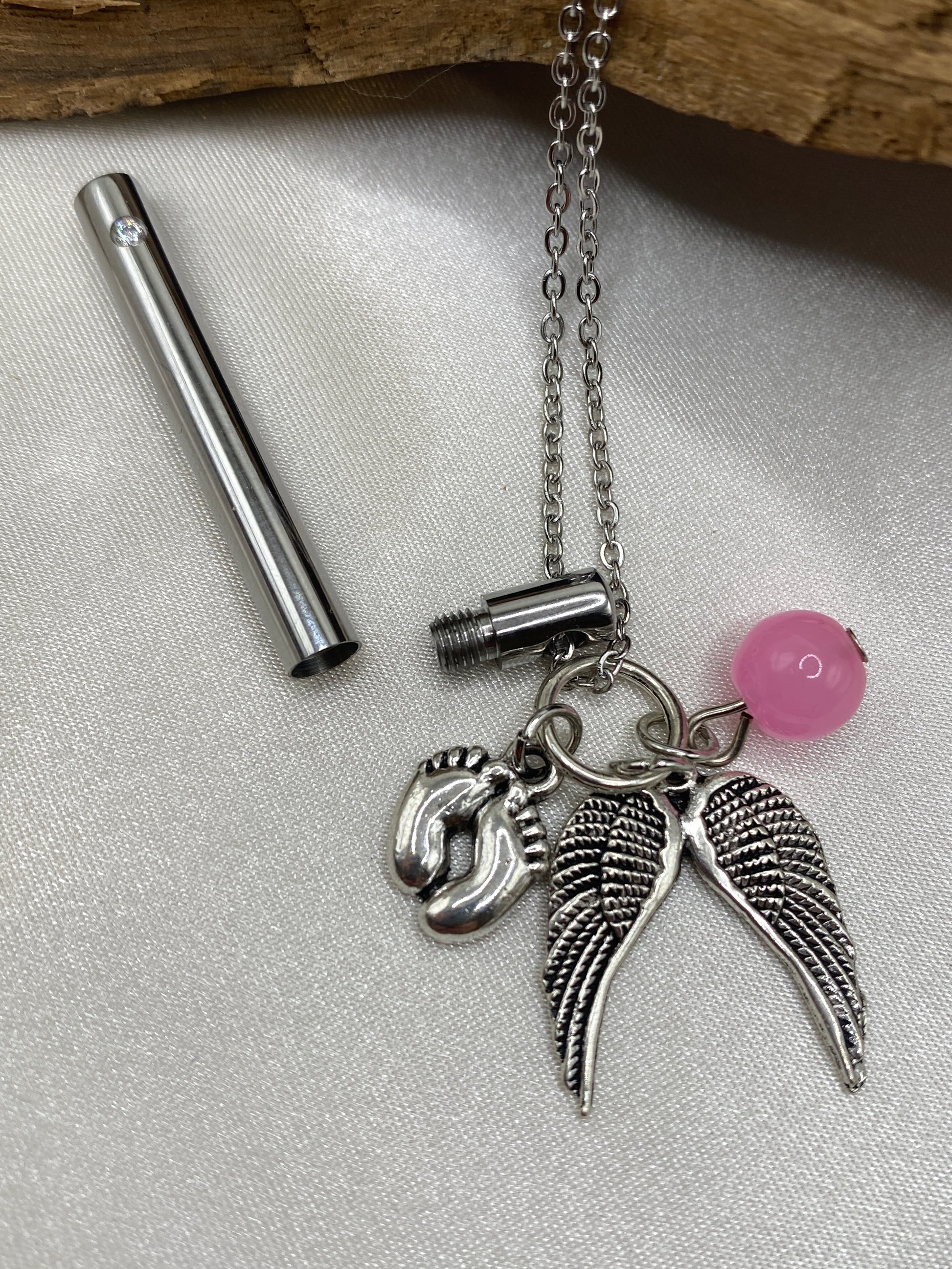 Openable cremation necklace with charms