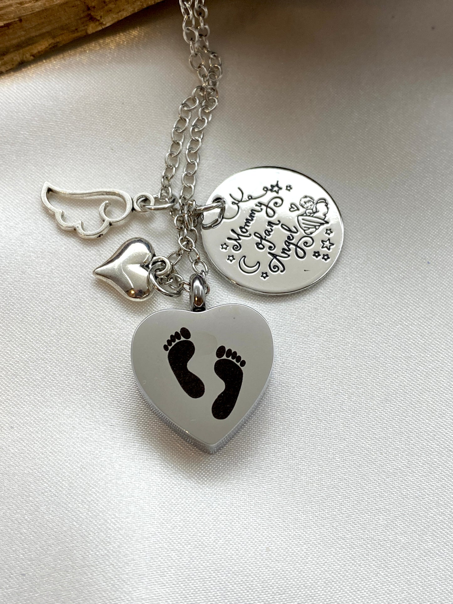 Stainless steel cremation heart necklace with charms