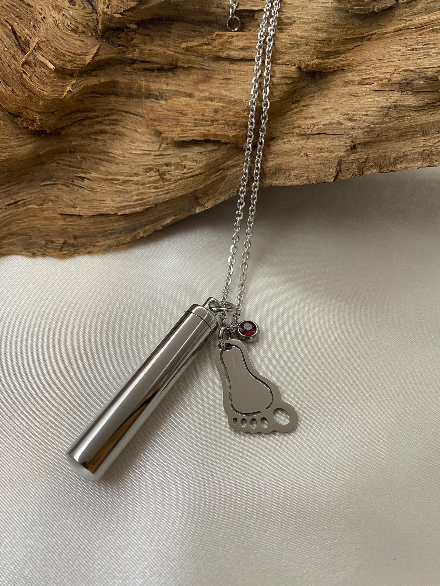 stainless steel cylinder with baby foot and rhinestone charm