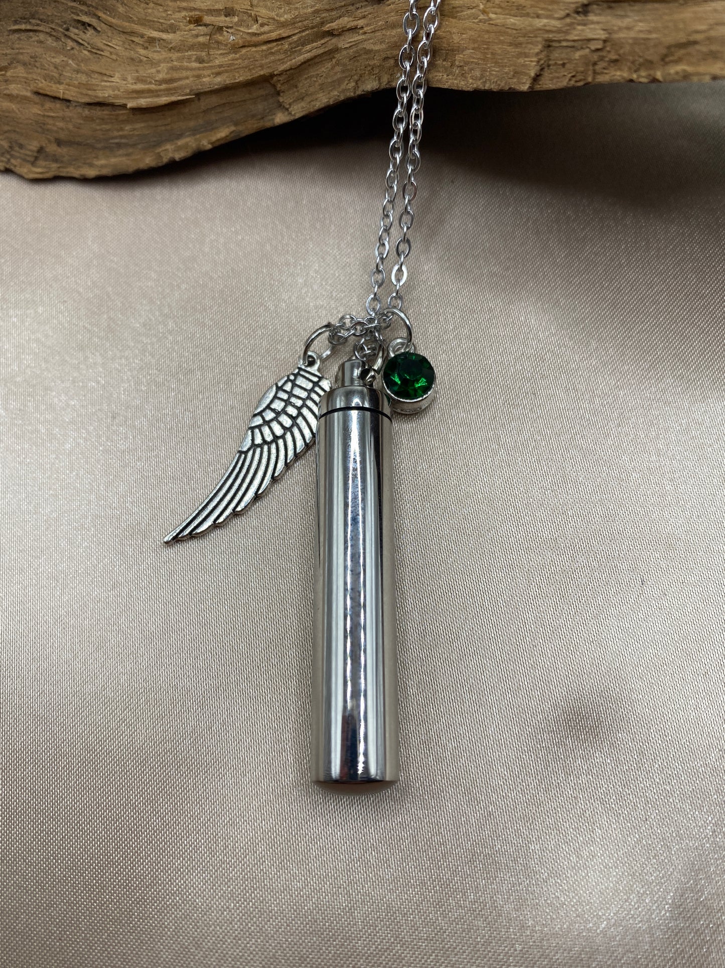 Cylinder cremation necklace with Angel wing charm and hunter green stone