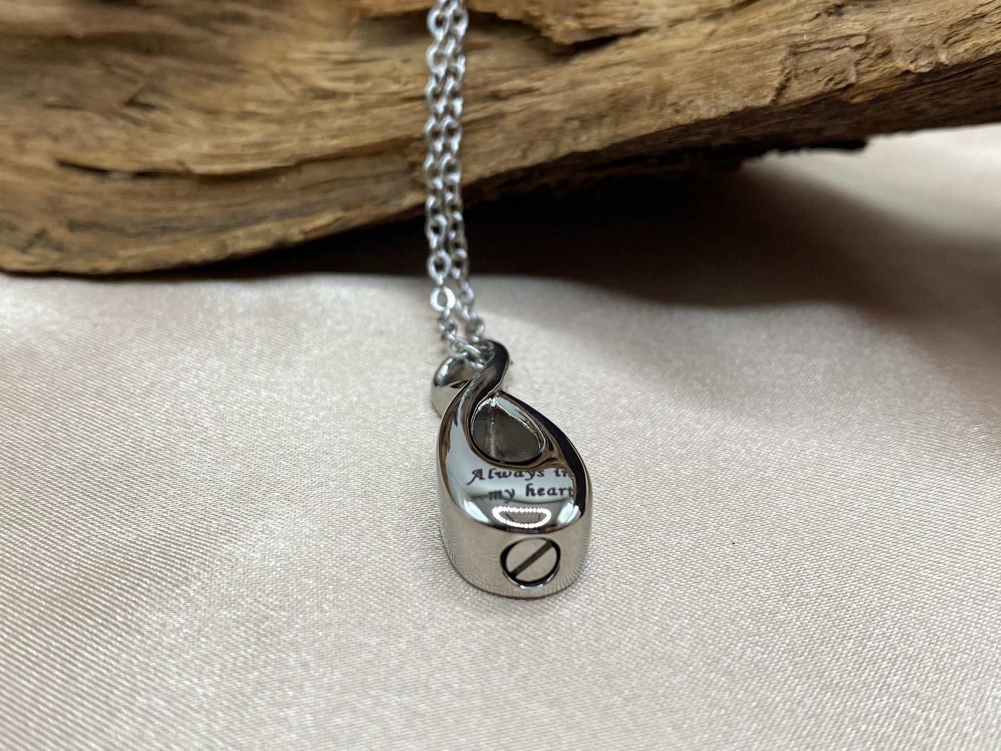 Infinity shaped cremation pendant
