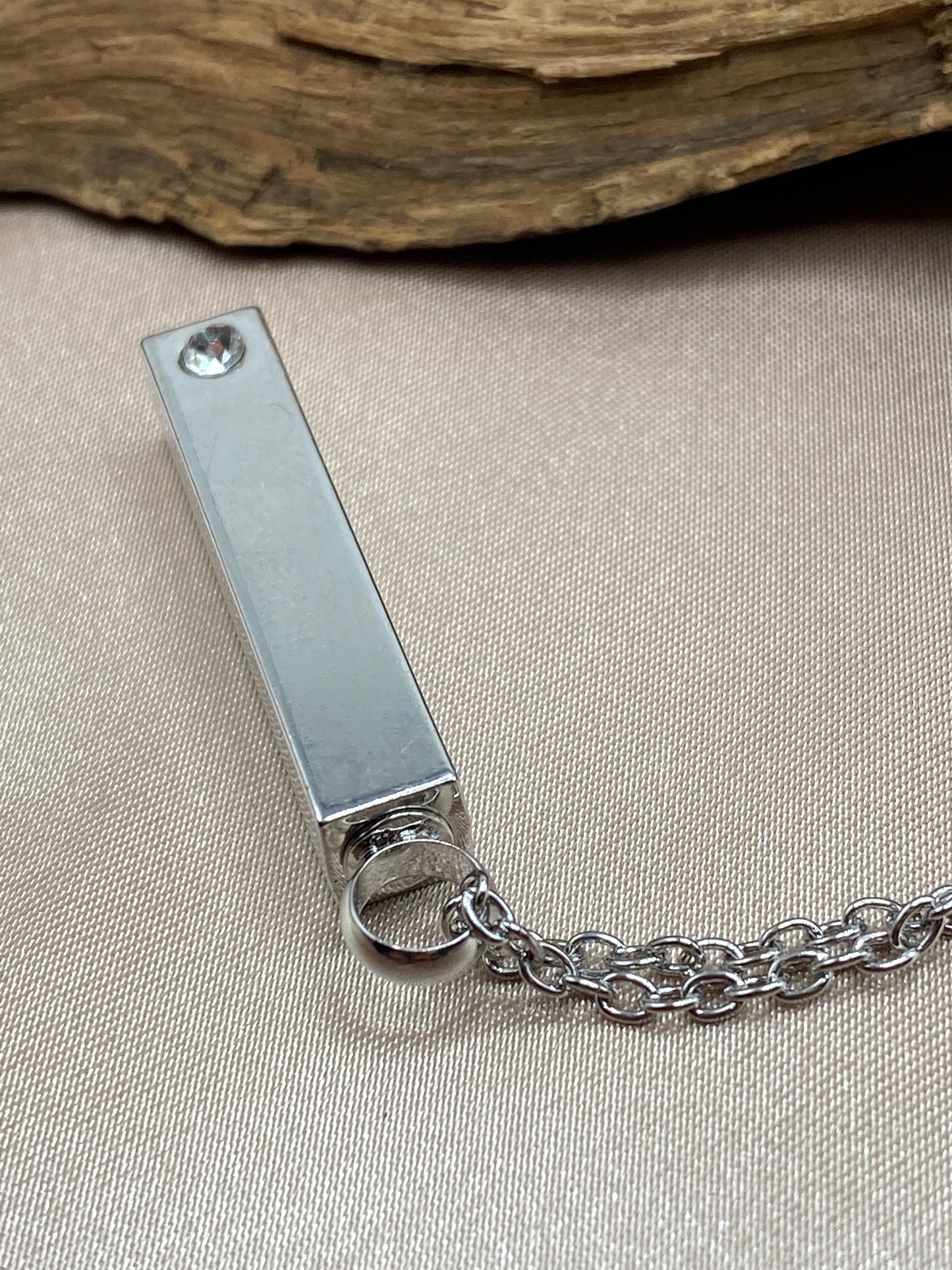 Stainless steel pendant with crystal stone