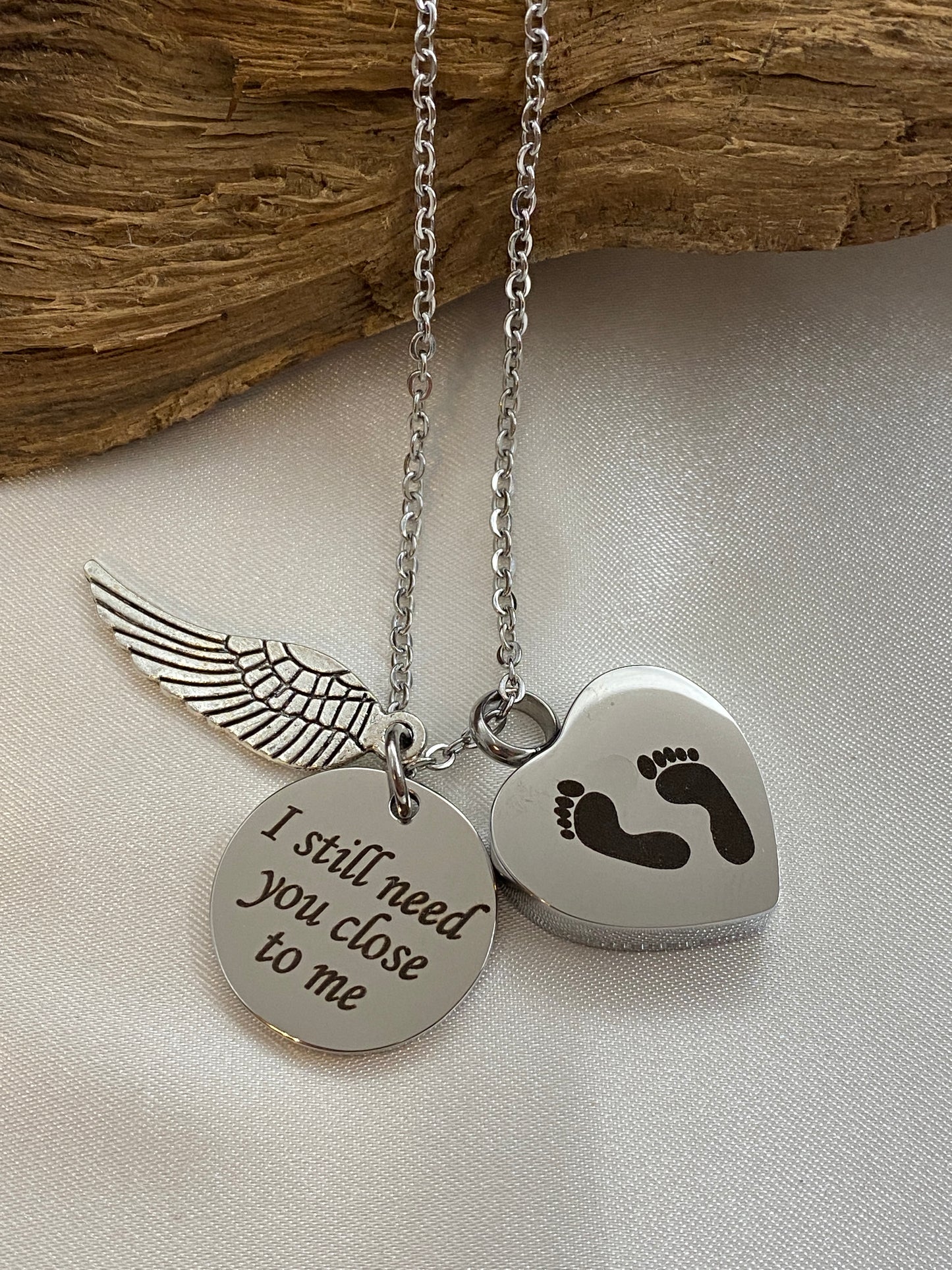 Stainless steel heart cremation necklace with baby feet and charms