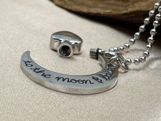 Openable moon and heart cremation necklace