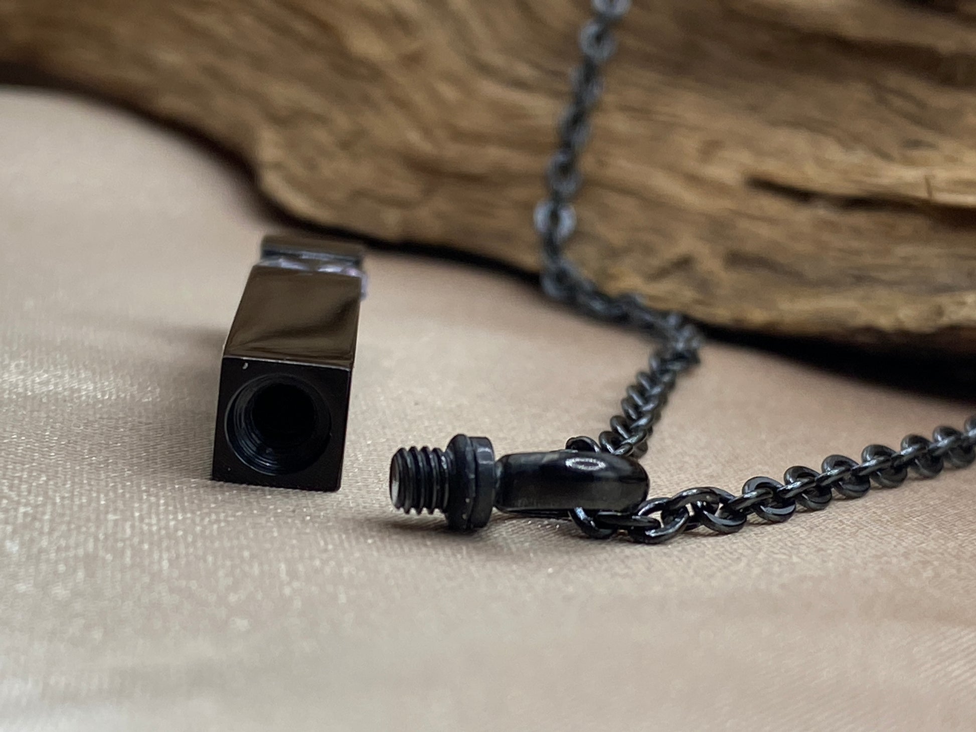 Twists open to hold human or pet ashes