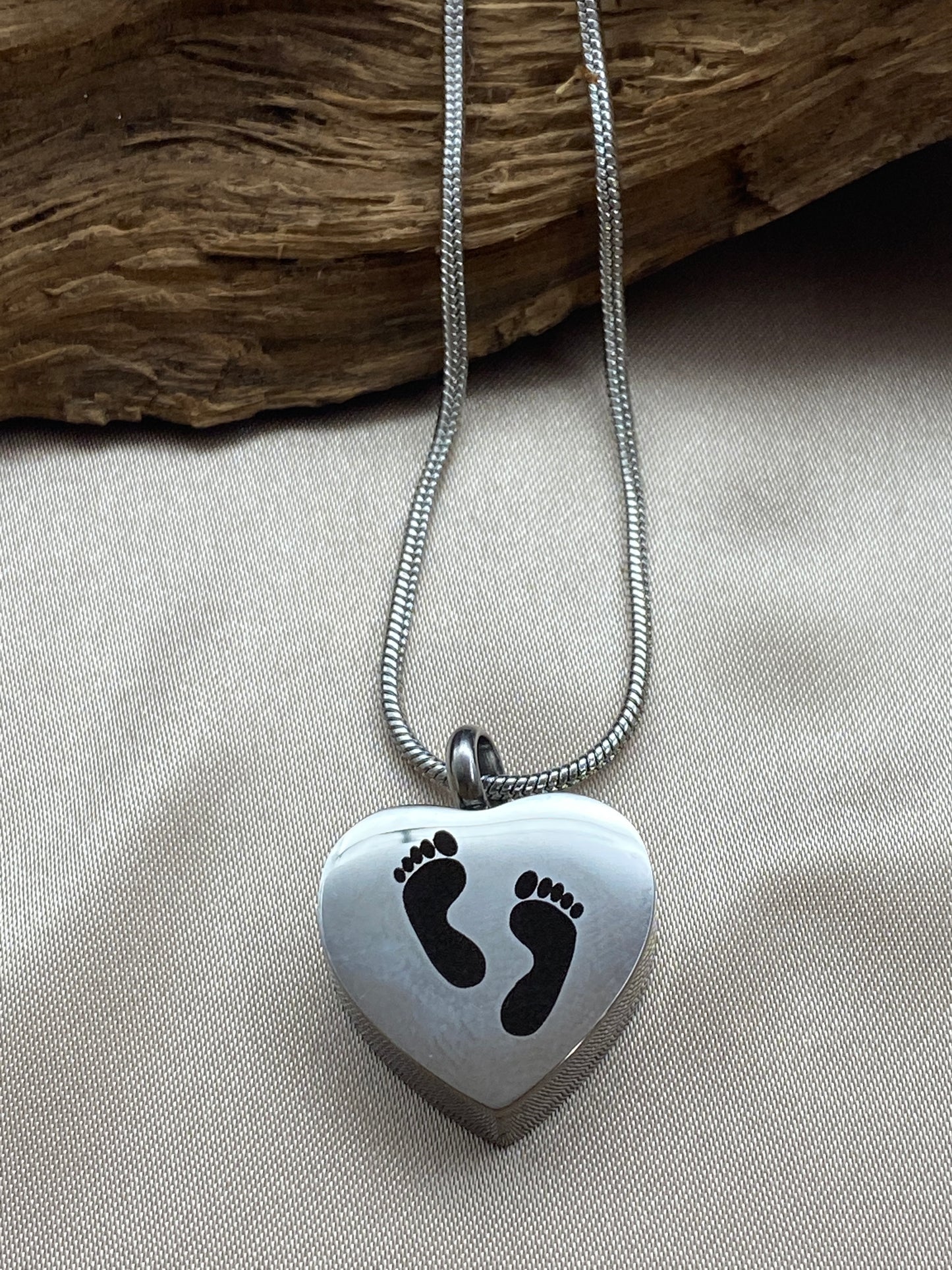 Heartfelt Tribute - Cremation Memorial Heart Urn Necklace for Baby Ashes with Baby Feet Engraved. An Enduring Remembrance of Precious Little Ones