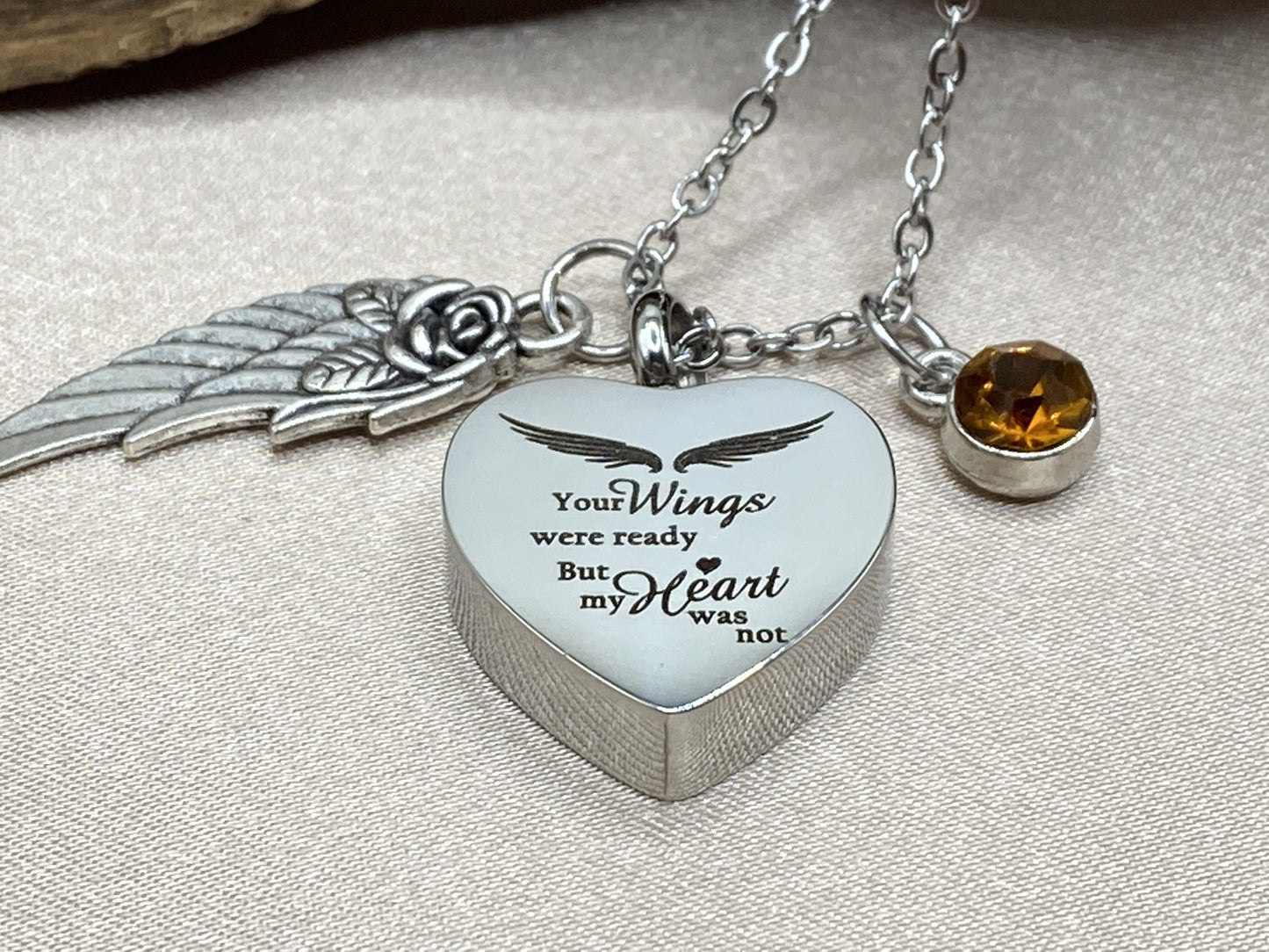 Cremation heart with charms for ashes