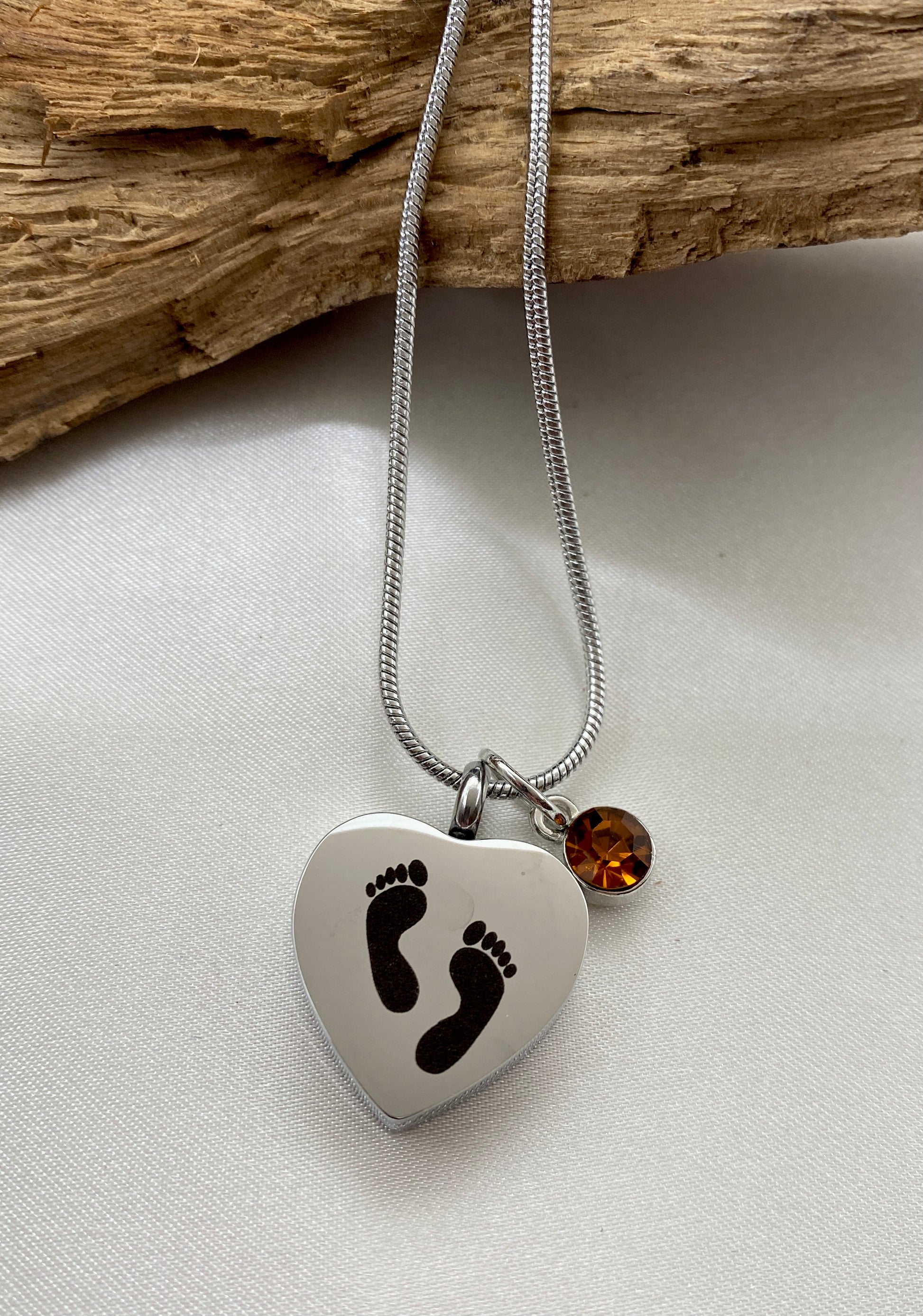 Baby feet cremation heart necklace with burnt orange stone