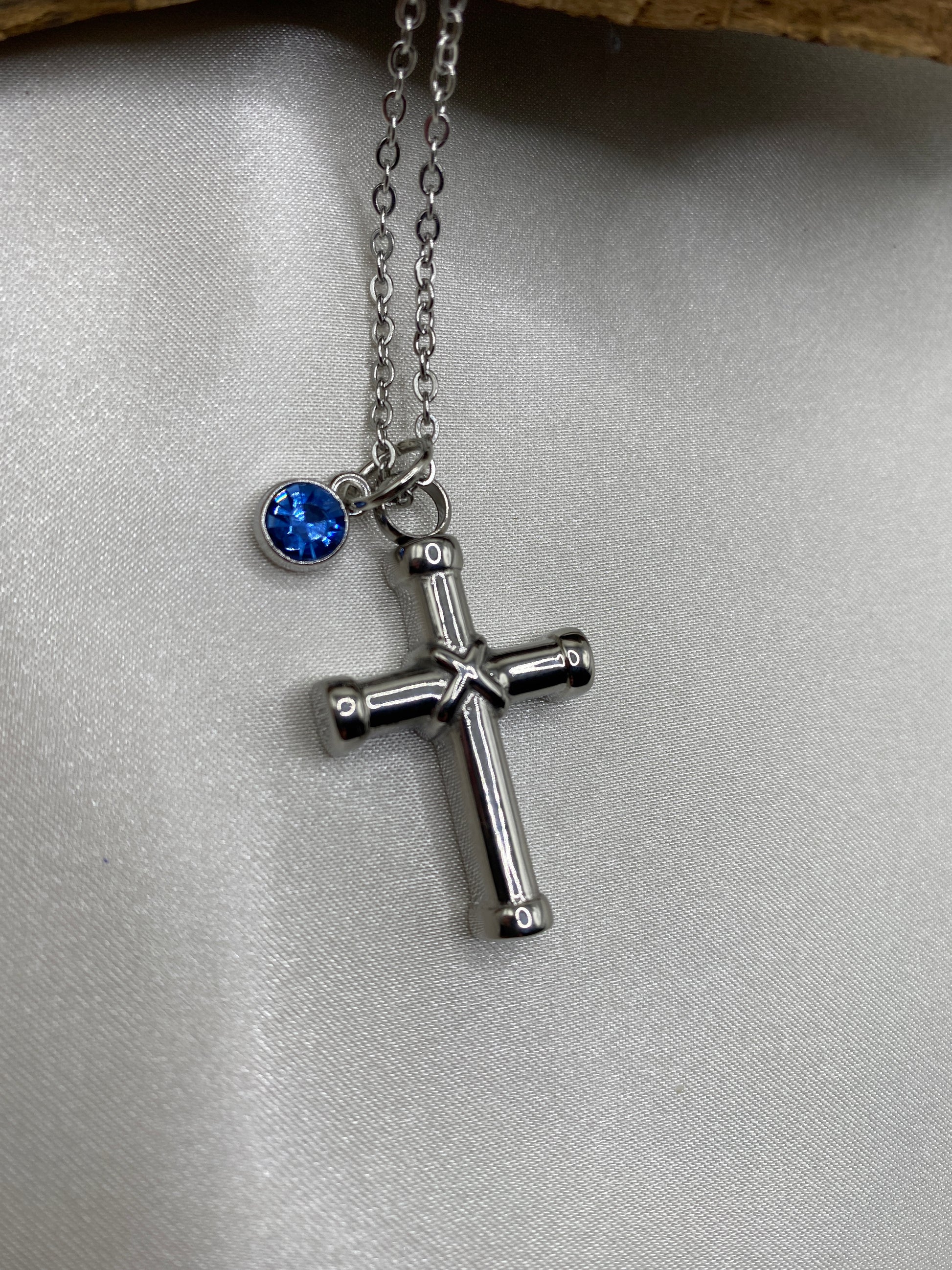 cremation cross necklace for ashes with aqua blue Stone