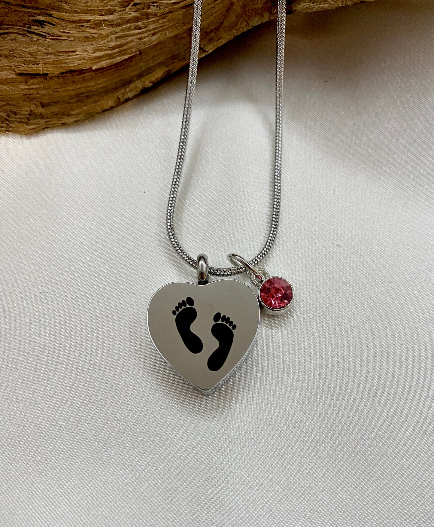 Baby feet cremation heart necklace with rosy pink stone