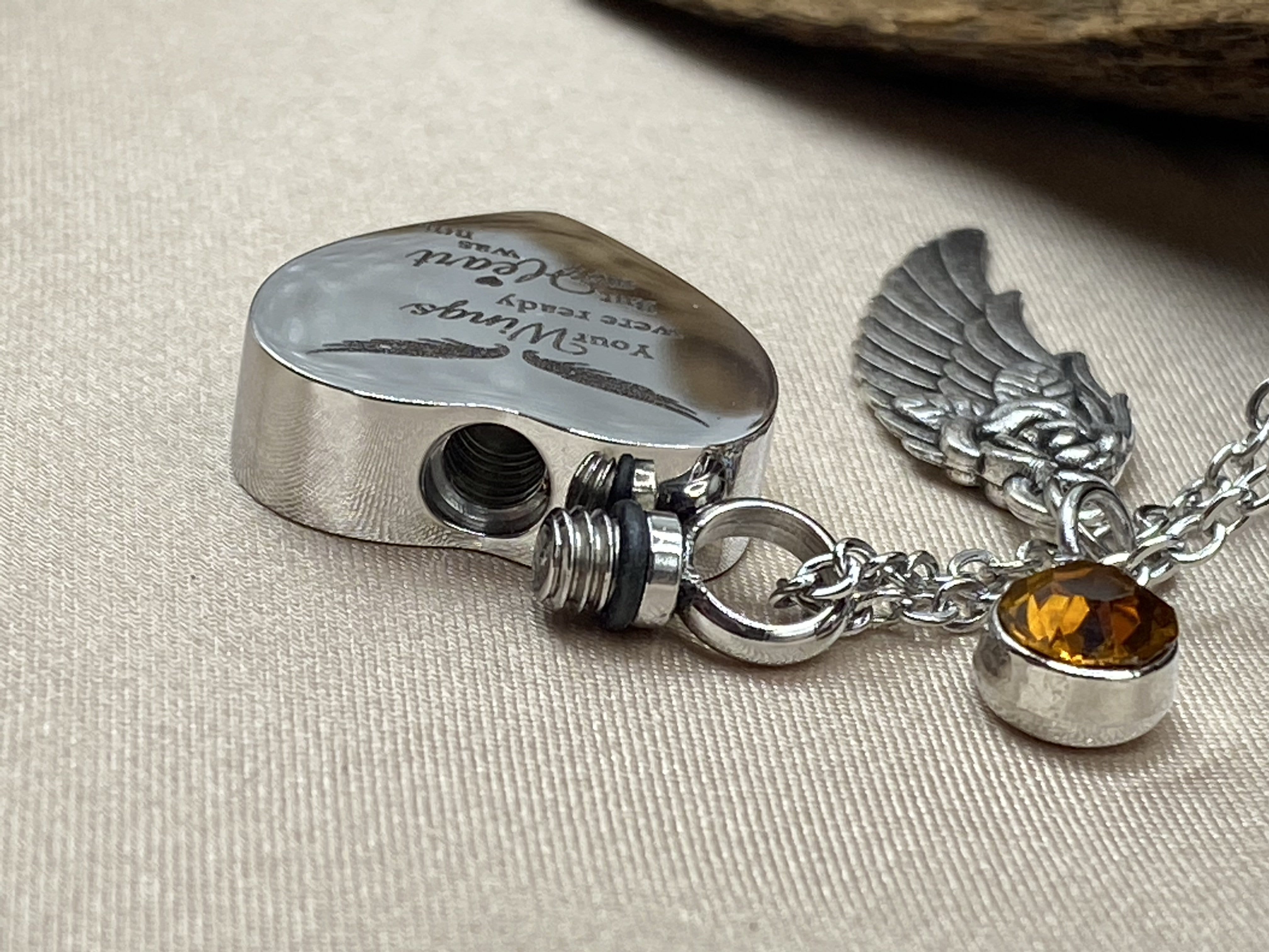 Heart Shaped cremation urn locket for ashes with Angel wing and