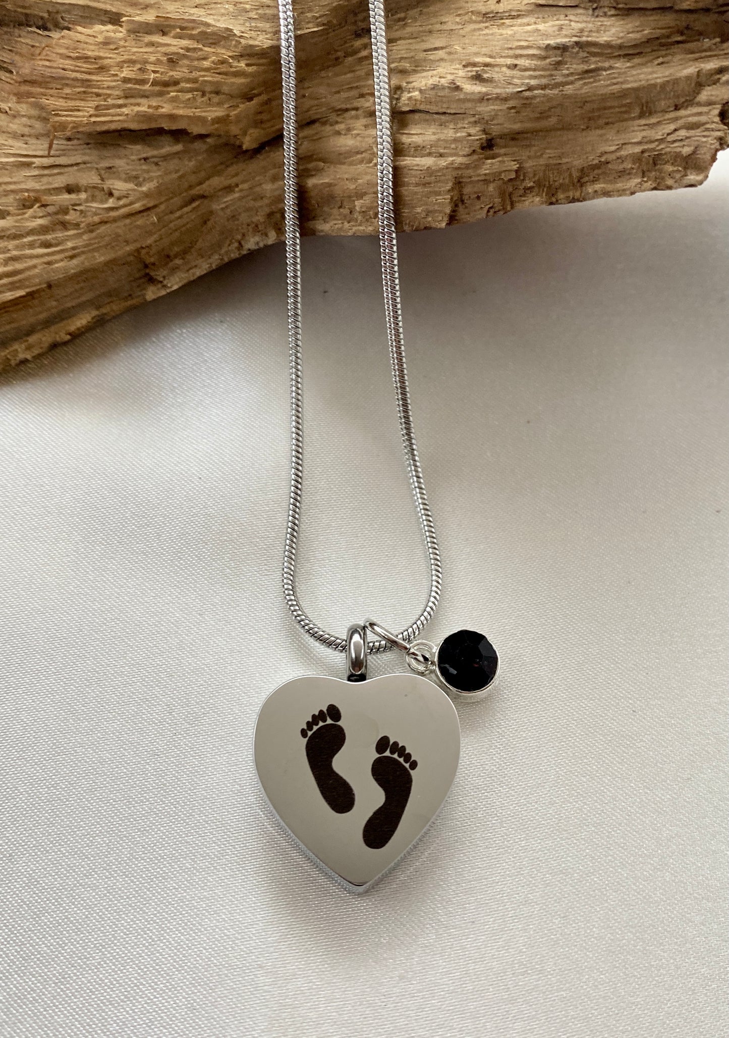 Baby feet cremation heart necklace with burgundy stone