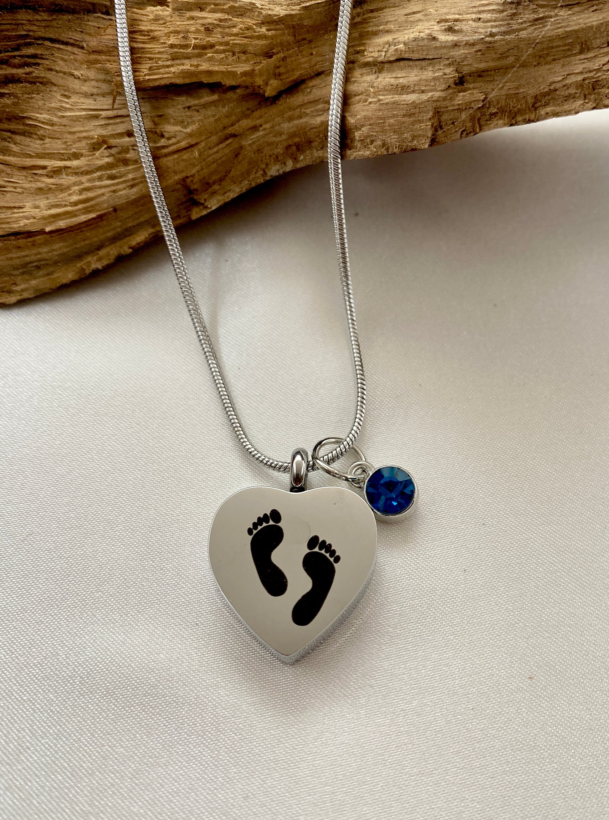 Baby feet cremation heart necklace with royal blue stone